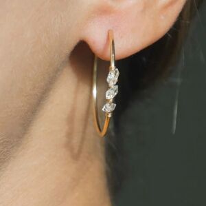 Gold hoop earrings with diamonds